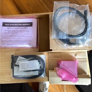 BRAND NEW ,directly from Mazda dealer  iPod Integration Module with Cables